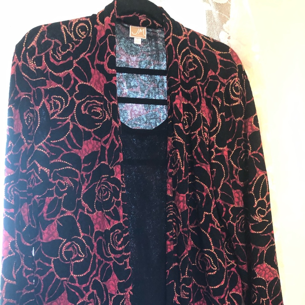 This red/black/gold top has an attached black tank